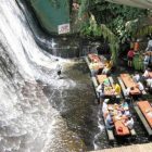 Villa Escudero Restaurant Exciting Villa Escudero Including Waterfalls Restaurant With Cozy Space To Enjoy The Dining Time With Wooden Table And Long Bench In The River Restaurant Unique Villa Design Providing Stunning Unusual Experience