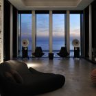 Wall Mural Striped Exotic Wall Mural Concrete Floor Striped Puffs Futuristic Dark Sofa Eclectic Fidar Beach House Innovative Sideboard Dark Side Table Dream Homes Futuristic Modern Beach House With Neutral Color Palettes For A Family Of Five