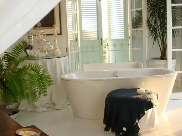 The Coral Grace Fabulous The Coral House On Grace Bay Master Bathroom Interior Involving Oval Bathtub And Skirted Glass Table Architecture Luminous Private Beach House With Stylish And Chic Exotic Interiors