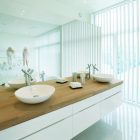 White Interior Bathroom Fabulous White Interior Design In Bathroom Of Villa G By Saunders Architecture Using Twin Basins On Wood Frame Hotels & Resorts Extraordinary Modern Villa Style With Dynamic Indoor Outdoors