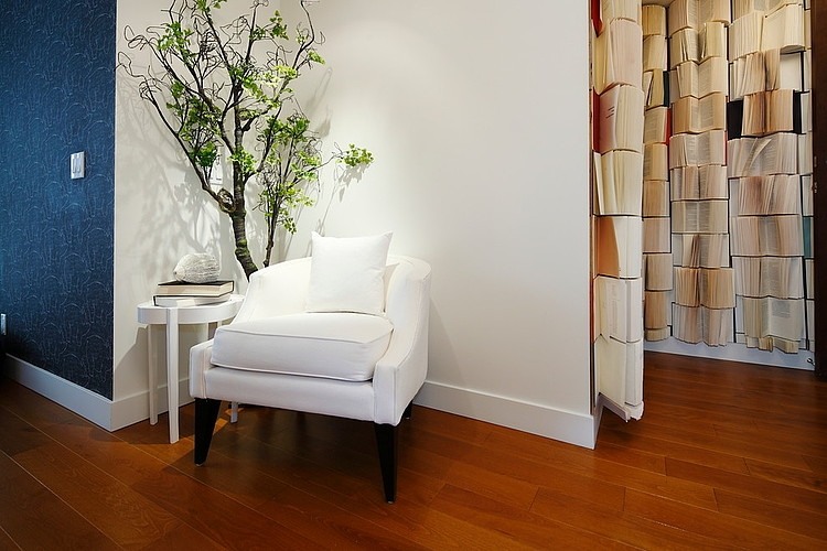 White Armchair Botanist Fancy White Armchair At Corner Botanist Suite I3 Design Group With Indoor Planter With White Side Table Interior Design Elegant Botanical Interior Decoration Within Contemporary Modern Apartment