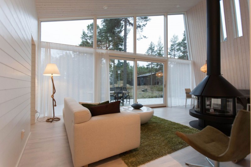 Gold Arch Living Fantastic Gold Arch Lamp In Living Room Of Chalet Lagunen Residence Completed With Transparent Drapes On White Glass Windows Dream Homes Luminous And Shining House With Contemporary Yet Balanced Color Palette