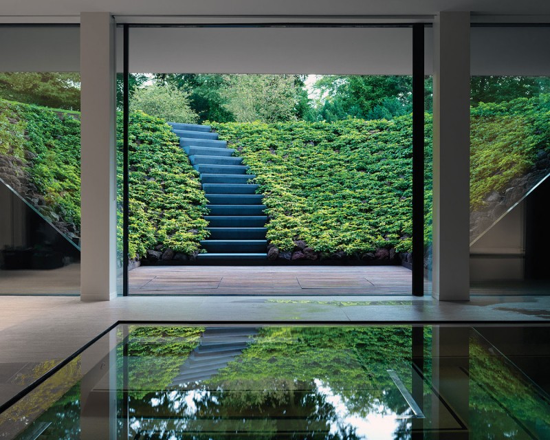 Pool Inside L Fantastic Pool Inside The Villa L With Some Wide Glass Walls Near The Concrete Staircase Outside Dream Homes Stunning Duplex Modern House Surrounded By Green Tree And Lawn Made From Concrete Material