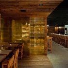 Gold Transparent Wooden Fascinating Gold Transparent Cabinets On Wooden Floor And Wooden Ceiling With Ceiling Lamp Inside Pio Pio Restaurant By Sebastian Marsical Studio Restaurant Stunning Wood Restaurant With Minimalist Decoration Approach
