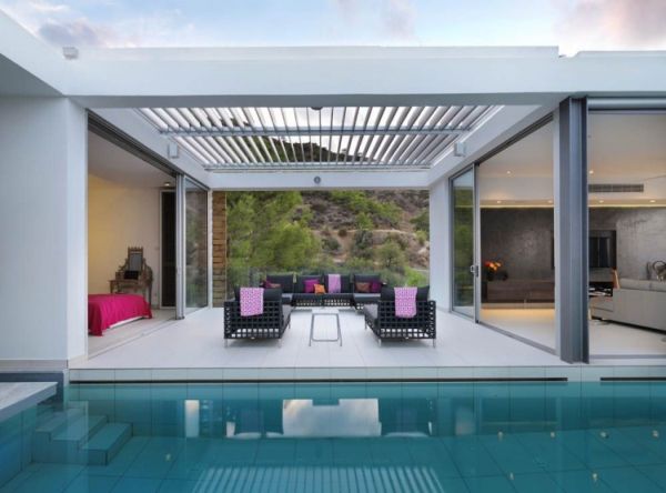 Patio Of Home Fascinating Patio Of The Vacation Home Transformed With Dark Chairs And White Side Table Near Blue Pool Dream Homes Breathtaking Modern Villa With Beautiful Patio And Wonderful Swimming Pool