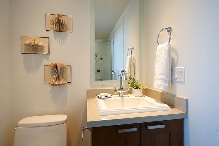 Powder Room Wall Fascinating Powder Room With Framed Wall Mirror And Wooden Vanity At Botanist Suite I3 Design Group With Towel Ring Interior Design Elegant Botanical Interior Decoration Within Contemporary Modern Apartment