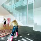 Colorful Patterned On Funny Colorful Patterned Round Rug On Gray Tiled Floor And Wood Glossy Floor Inside Villa G By Saunders Architecture Hotels & Resorts Extraordinary Modern Villa Style With Dynamic Indoor Outdoors