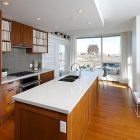 Kitchen With At Gorgeous Kitchen With Wooden Cabinet At Botanist Suite I3 Design Group And Granite Countertop Also Glass Tile Backsplash Interior Design Elegant Botanical Interior Decoration Within Contemporary Modern Apartment