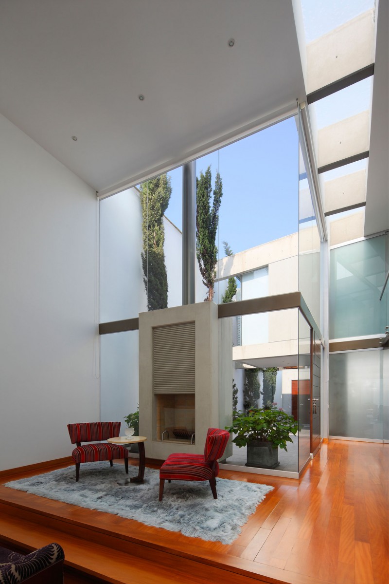 Red Chairs Fireplace Gorgeous Red Chairs And Concrete Fireplace In The Patio Residence With Grey Rug And Hardwood Floor Dream Homes Stunning White Home With Authentic Patio In Modern Style