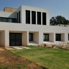 Fidar Beach Modern Innovative Fidar Beach House In Modern Minimalist Architecture Rectangular Glass Window Concrete Path Huge Rocks On Wide Yard Dream Homes Futuristic Modern Beach House With Neutral Color Palettes For A Family Of Five