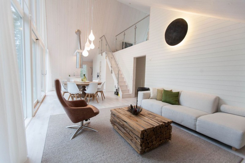 Living Room Black Inspiring Living Room Completed With Black Wall Lamp And Tulips Shaped Pendant Lamp Of Chalet Lagunen Residence Dream Homes Luminous And Shining House With Contemporary Yet Balanced Color Palette