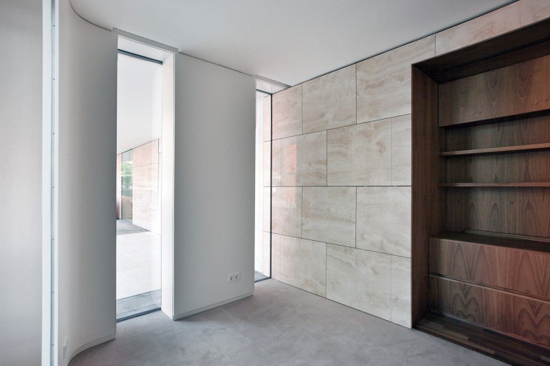 Corner Inside L Interesting Corner Inside The Villa L With Wooden Shelves And Wide Glass Walls Under The White Ceiling Dream Homes Stunning Duplex Modern House Surrounded By Green Tree And Lawn Made From Concrete Material