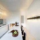 Kitchen In Madrid Interesting Kitchen In Ceramic House Madrid Spain With Long White Counter And Black Stools Facing White Cabinets Interior Design Elegant Ceramic Interior Design With Beautiful Dining And Kitchen Partition