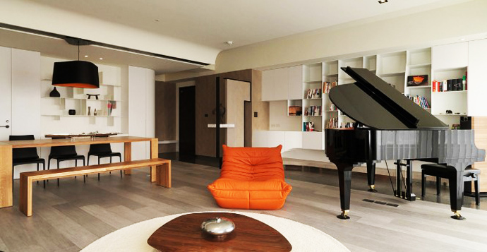 Orange Chair Couple Interesting Orange Chair Placed To Couple Round Wooden Table Inside Apartment Unitary Room With Grand Piano Apartments Delightful Simple Interior Design In Neutral Palette And Vivid Furniture
