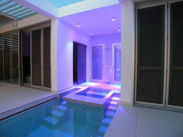 Purple Light Vacation Interesting Purple Light In The Vacation Home Transformed Exterior With Long Blue Pool And White Ceiling Dream Homes Breathtaking Modern Villa With Beautiful Patio And Wonderful Swimming Pool