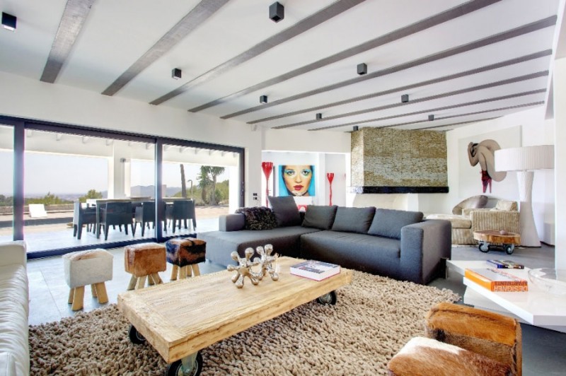 Stools In By Interesting Stools In The Villa By The Sea Sitting Space With Brown Rug And Grey Sectional Sofa Dream Homes  Beautiful And Contemporary Spanish Villa With Open Living Room