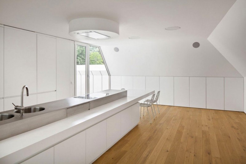 White Kitchen The Long White Kitchen Counter In The House VMVK With White Stools And White Cabinets On Wooden Floor Dream Homes  Chic Modern Belgian House With Elegant Interior Designs