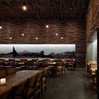 Pio Pio Sebastian Luxurious Pio Pio Restaurant By Sebastian Marsical Studio With Many Small Ceiling Lamp Above Wooden Dining Table And Chairs Restaurant Stunning Wood Restaurant With Minimalist Decoration Approach