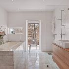 White Modern Stockholm Luxurious White Modern Villa Near Stockholm Bathroom Idea Featured With Marble Tub And Double Vanity Next To Shower Dream Homes Stunningly Beautiful Villa Decorated In Modern Scandinavian Style