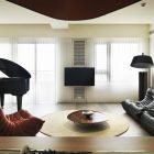 Dark Themed Inside Masculine Dark Themed Furnishing Placed Inside White Themed Apartment Living Room With Grand Piano Unit Apartments Delightful Simple Interior Design In Neutral Palette And Vivid Furniture