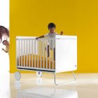 Crib Nursery With Minimalist Crib Nursery Furniture Design With White Banister And Steel Wheels Equipped With Yellow Bed Cover For Baby Girl Kids Room Creative Kids Bedroom Decorated With Cheerful And Playful Themes