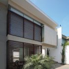 Details In Residence Minimalist Details In The Patio Residence Exterior With Wooden Shutters And White Ceiling Above Stone Floor Dream Homes Stunning White Home With Authentic Patio In Modern Style