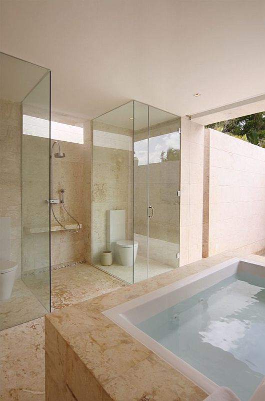 Yet Exotic Villa Minimalist Yet Exotic Bathing Space Villa Decoration Applies The Transparent Glass Cover And Yellowish Floor In Dominican Republic Interior Design  Exotic Modern Villa Design With Beautiful Living Room In Santo Domingo