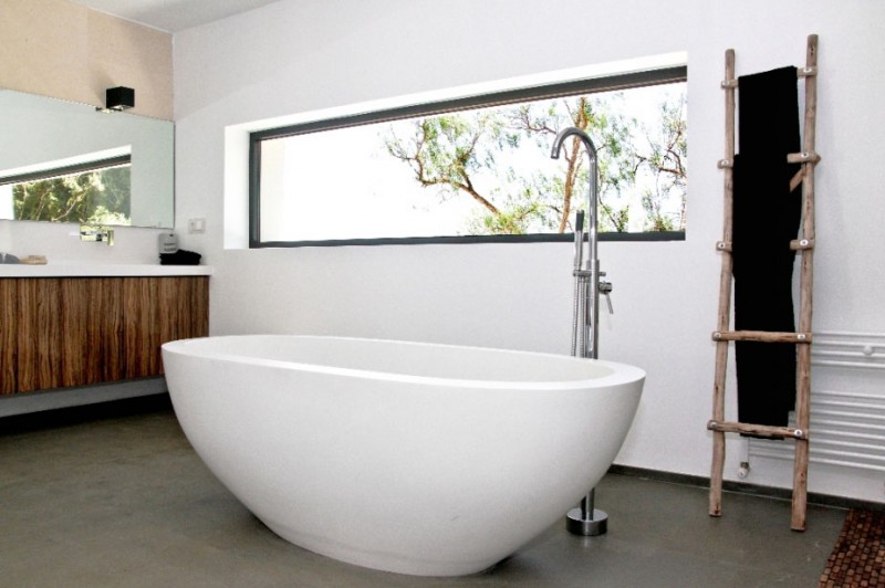 Bathroom In The Modern Bathroom In Villa By The Sea With White Tub And Long Wooden Vanity Under Long Mirror Dream Homes Beautiful And Contemporary Spanish Villa With Open Living Room