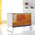 Nursery Furniture Crib Modern Nursery Furniture With Awesome Crib Model And Attractive Dresser With Three Drawers Completed With Small Bookshelves On The Wall Kids Room Creative Kids Bedroom Decorated With Cheerful And Playful Themes