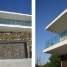 Stone Wall Garage Natural Stone Wall And Wide Garage Door In The Vacation Home Transformed Exterior With Wide Glass Walls Dream Homes Breathtaking Modern Villa With Beautiful Patio And Wonderful Swimming Pool