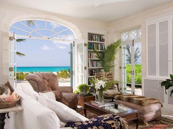 The Coral Grace Nice The Coral House On Grace Bay Living Room Idea Integrating Brown Chair Ottoman And White Sofa With Pillows Architecture Luminous Private Beach House With Stylish And Chic Exotic Interiors