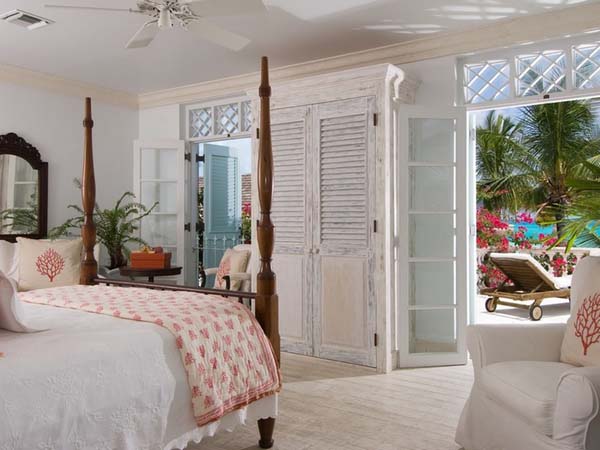 The Coral Grace Open The Coral House On Grace Bay Bedroom Idea Involving Four Poster Bed Idea Coupled With Skirted Chair Architecture Luminous Private Beach House With Stylish And Chic Exotic Interiors