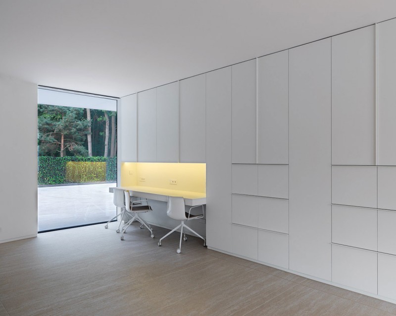 Home Office The Simple Home Office Space In The Villa L With White Desk And White Chairs Near White Cabinets Dream Homes Stunning Duplex Modern House Surrounded By Green Tree And Lawn Made From Concrete Material