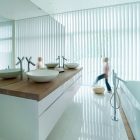 White Round On Simple White Round Twin Sinks On Wooden Frame Of Bathroom In Villa G By Saunders Architecture Installed On White Tiled Floor Hotels & Resorts Extraordinary Modern Villa Style With Dynamic Indoor Outdoors