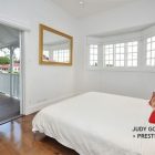 Modern Hitech Dominated Spacious Modern Hitech Mansion Bedroom Dominated With White Room Decor And Furnished With Bright Red Bed Throw Pillows Interior Design Beautiful Interior Design In Modern Hi-Tech Mansion House Of Paddington