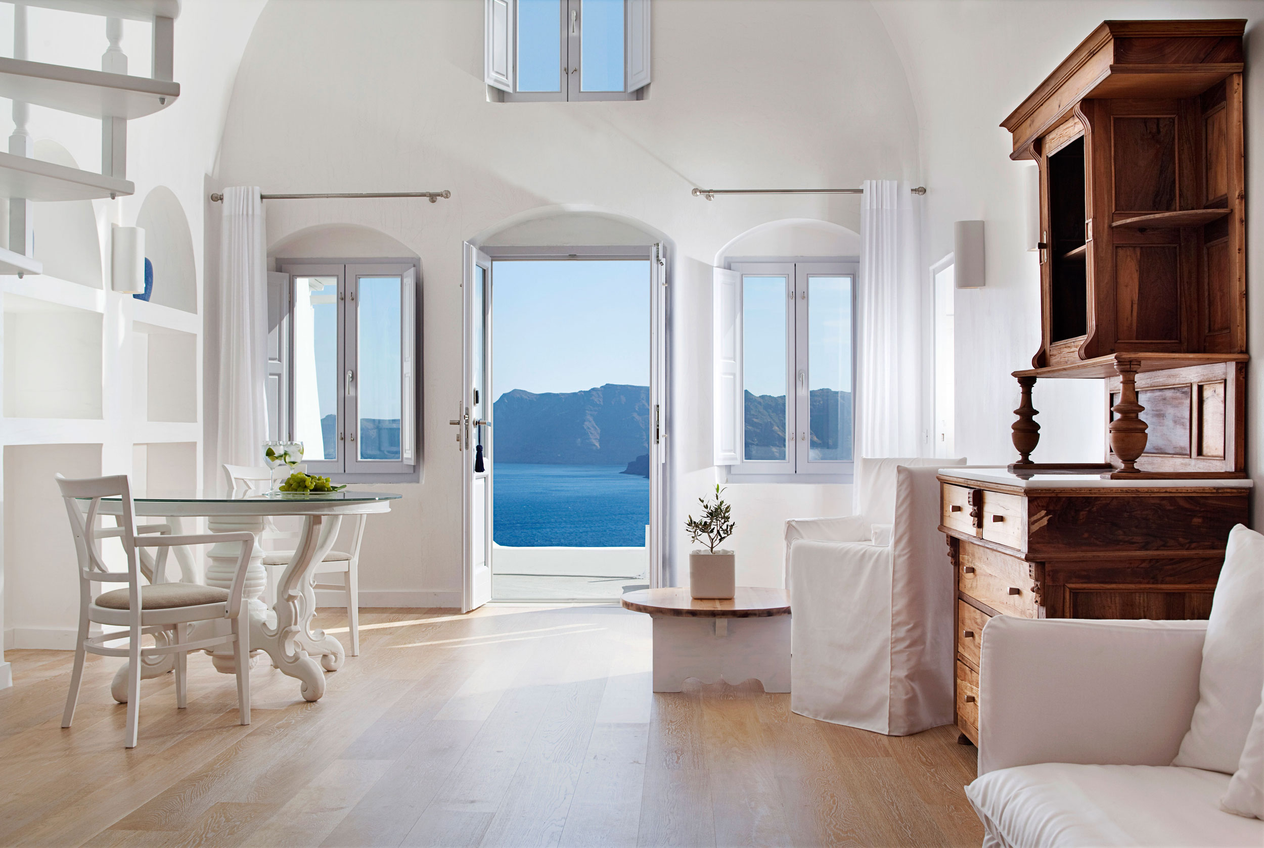 Hallway Design Hotels Stunning Hallway Design At Katikies Hotels In Oia Applied White Oak Floor And White Wall Decor White Fabric Sofa  Classy And Elegant White Home With Breathtaking Panoramic Sea Views