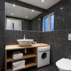 White Black Of Terrific White Black Tiled Wall Of Bathroom In Chalet Lagunen Residence Completed With Washing Machine And Wooden Open Cabinets Dream Homes Luminous And Shining House With Contemporary Yet Balanced Color Palette