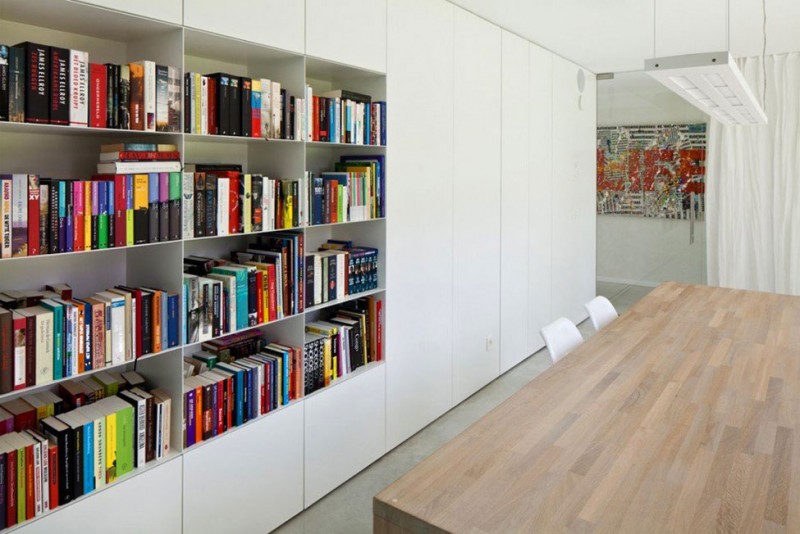 White Bookshelves House Tidy White Bookshelves In The House VMVK With Wide Wooden Table And White Chairs Under White Ceiling Dream Homes  Chic Modern Belgian House With Elegant Interior Designs