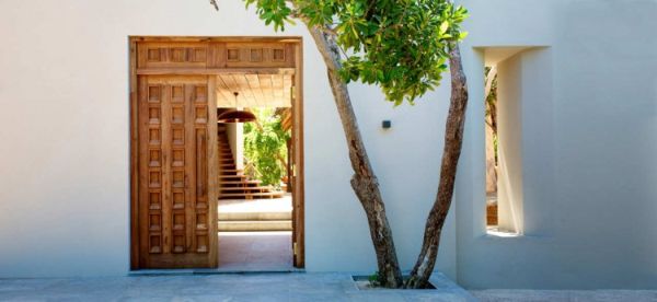 Wooden Doors Wall Traditional Wooden Doors And White Wall In The Villas Suluwilo By Studio COA Facade With Green Tree Decoration Wonderful Modern Villa With Gorgeous Inner Courtyards And Open Living Space