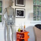 Human Sculpture To Uncommon Human Sculpture Displayed Next To Orange Wine Cart To Maximize Modern Residence Lounge Interior Dream Homes Beautiful Art Deco Home With Views Of Contemporary Interiors
