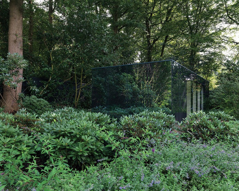 Mirrored Wall Small Unique Mirrored Wall Of The Small Building Near Villa L Backyard With Flat Roof And Cube Shape Dream Homes Stunning Duplex Modern House Surrounded By Green Tree And Lawn Made From Concrete Material