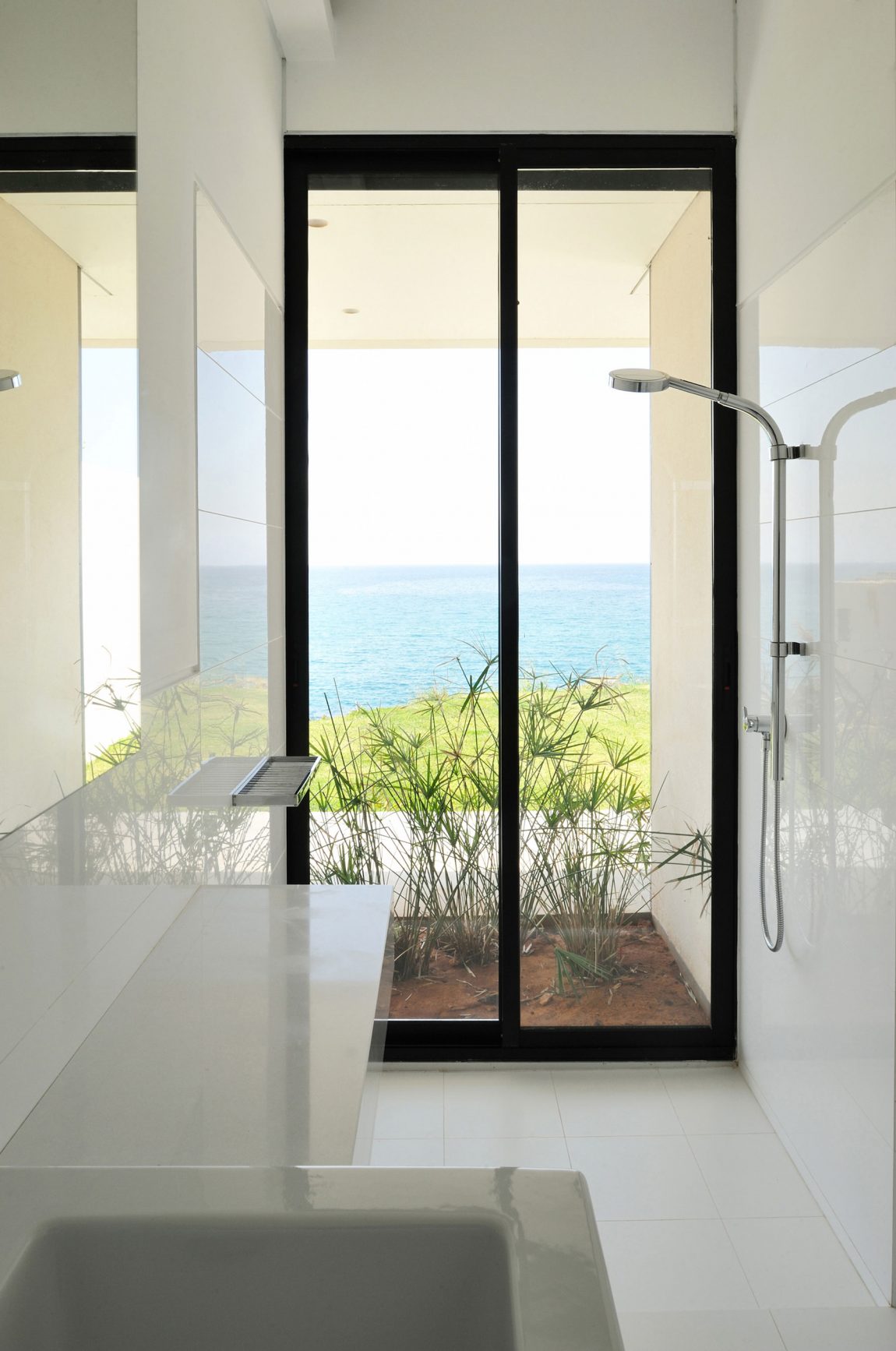 Beach View Plants Wonderful Beach View And Ornamental Plants Fidar Beach House Interior Glass Door In Dark Frame Stainless Steel Shower Porcelain Washing Stand Office & Workspace  Futuristic Modern Beach House With Neutral Color Palettes For A Family Of Five