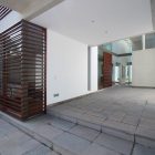 View Of Residence Wonderful View Of The Patio Residence Entrance With Wooden Door And Wide Glass Walls Near Wooden Shutters Dream Homes Stunning White Home With Authentic Patio In Modern Style