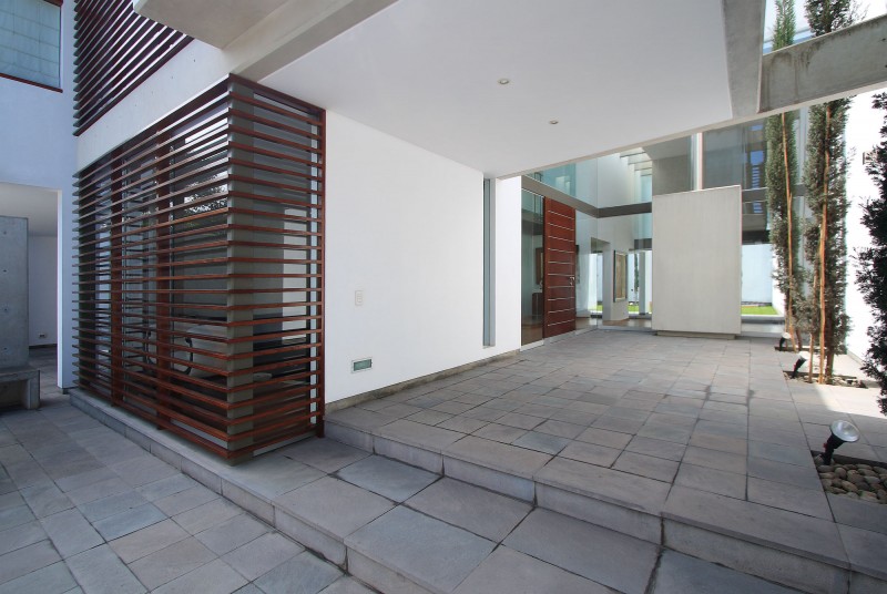 View Of Residence Wonderful View Of The Patio Residence Entrance With Wooden Door And Wide Glass Walls Near Wooden Shutters Furniture Stunning White Home With Authentic Patio In Modern Style
