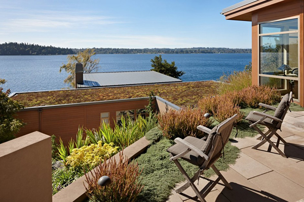 Roof View Lake Amazing Roof View Of The Lake House With Wooden Chairs And Brown Stone Floor Facing Panoramic Blue Water Dream Homes  Contemporary Lake House Integrates With Beautiful Natural Landscape