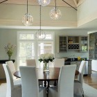 Dining Room Circular Appealing Dining Room Design With Circular Dark Wood Dining Table And Grey Covered Chairs At Falmouth Residence Marthas Vineyard Interior Design Fabulous Classic Interior Decoration With Surrounding Windows Design