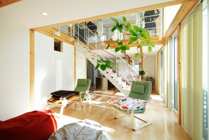 Home Interior Japanese Astounding Home Interior Decor Of Japanese Minimalist Design Including Green Loungers And Glass Table On Wooden Flooring With A Trees At Backside Dream Homes  Elegant Japanese Interior Style With Astonishing Natural Look