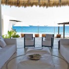 Outdoor Living Of Astounding Outdoor Living Room Design Of Villa Grey Cape With White Colored Soft Sofa And Several White Colored Pillows Interior Design Fabulous Relaxing Interior From Villa Grey Cape In Mexico
