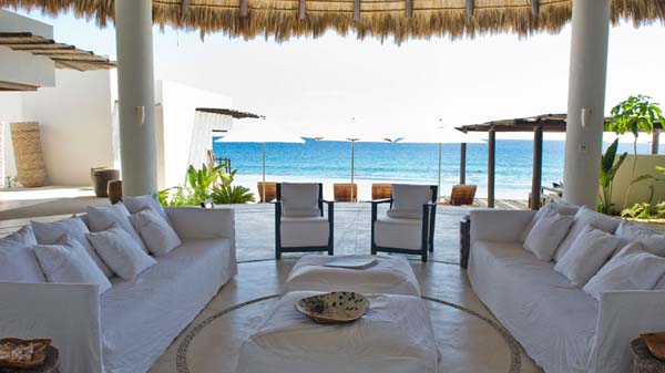 Outdoor Living Of Astounding Outdoor Living Room Design Of Villa Grey Cape With White Colored Soft Sofa And Several White Colored Pillows Interior Design Fabulous Relaxing Interior From Villa Grey Cape In Mexico