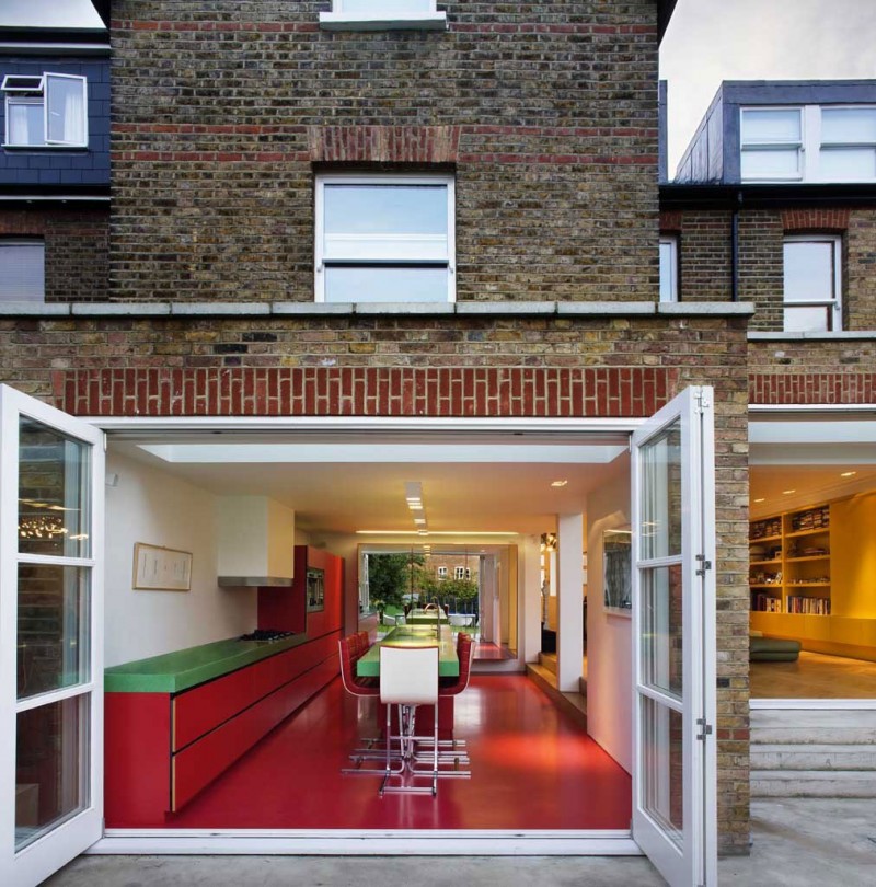 White Red Chairs Attractive White Red Decorative Single Chairs With Green Wooden Dining Desk On The Red Floor Inside Chevron Residence Dream Homes Elegant And Vibrant Interior Design For Stunning Creative Brick House